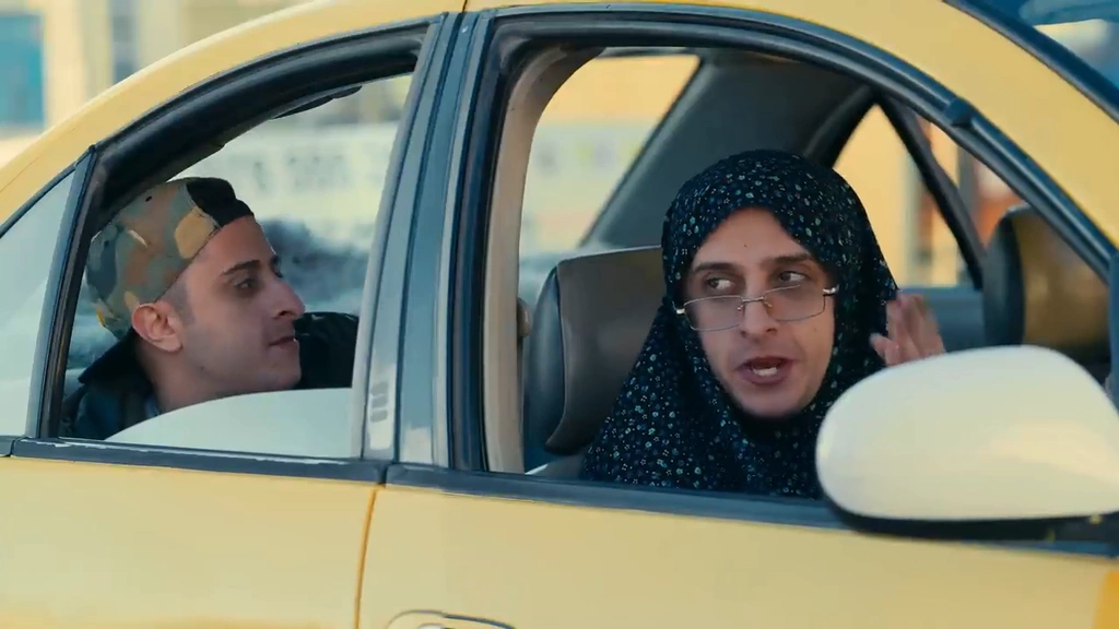 Two characters framed through the open windows of a yellow taxi in daylight.