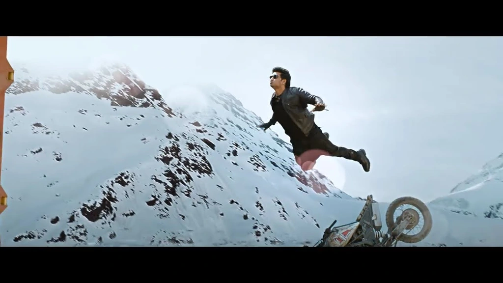 An action sequence against a snow-covered mountain landscape from the SPY teaser.